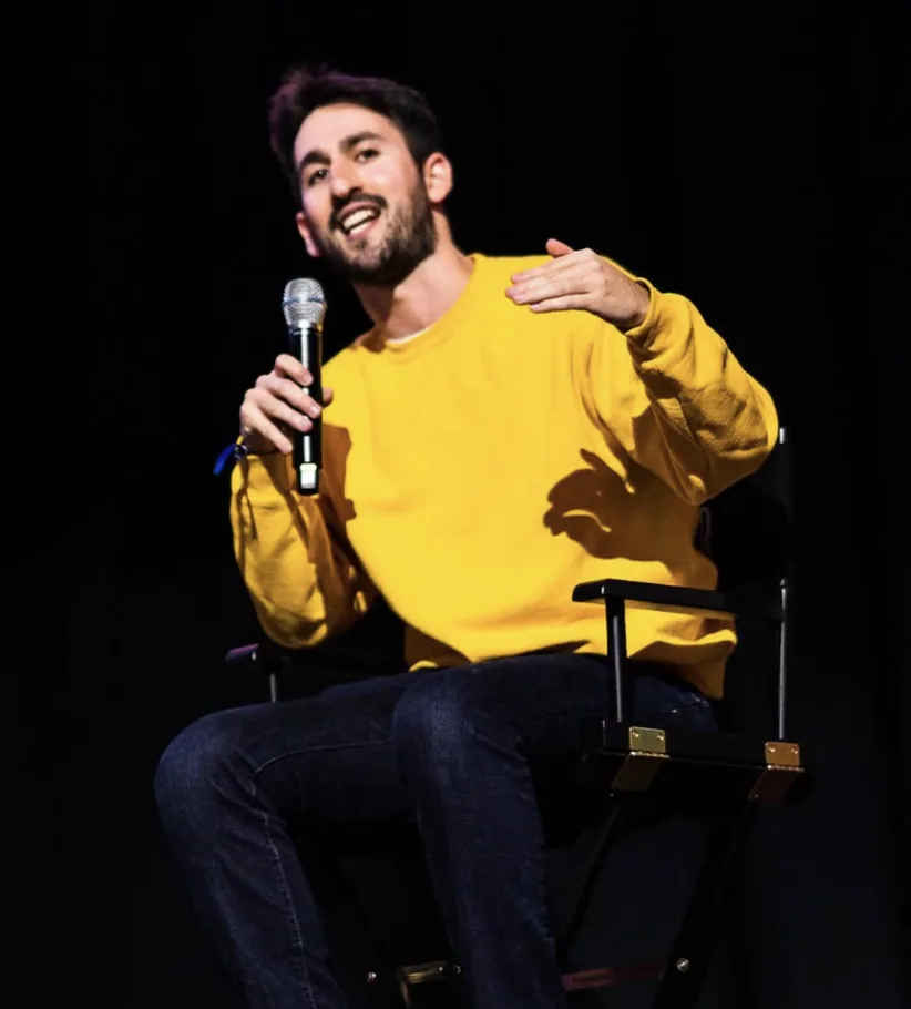 Jacob Eisenberg speaking on stage